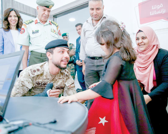 HRH Crown Prince Hussein visits the Cochlear Implant Centre at Al Hussein Medical Centre on Wednesday (Photo courtesy of Royal Court)