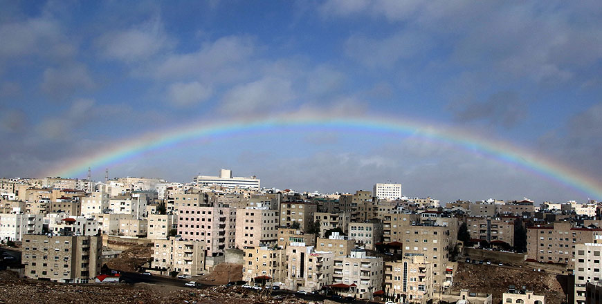 A rainbow is seen in Amman’s sky on Friday after heavy rainfall (Photo by Osama Aqarbeh)