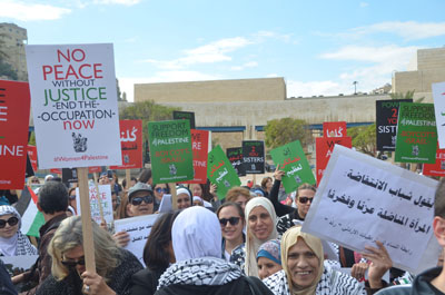 Jordanian women gather at Al Nakheel Square in downtown Amman on Friday in a show of support for their Palestinian peers  (Photo by Muath Freij)