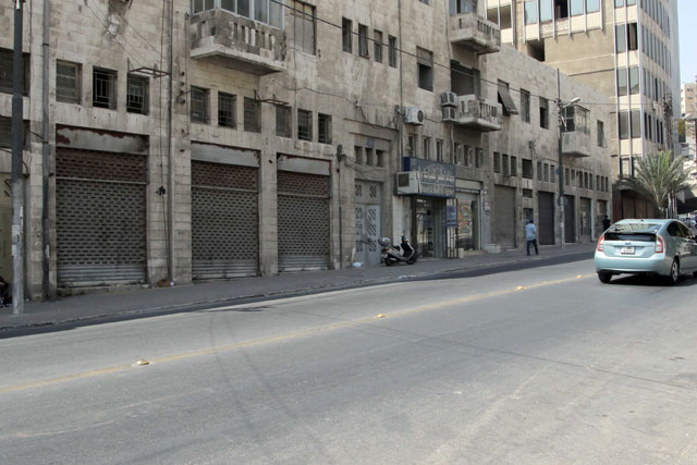 Shops in downtown Amman are closed on Tuesday in protest over ‘stringent parking regulations’ that traders say are driving customers away (Photo by Osama Aqarbeh)