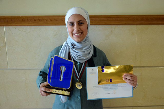 Jordan Arab Reading Challenge champion Duha Hussein, a 10th grade student, poses in Amman on Wednesday (Photo courtesy of Al Maktoum Global Initiatives)