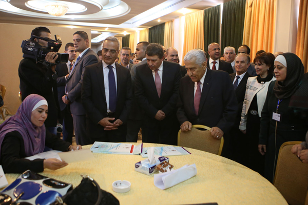 Prime Minister Abdullah Ensour and members of his Cabinet visit a job fair at Al Hussein Youth City on Thursday (Photo by Raad Adayleh)