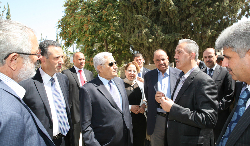 Prime Minister Abdullah Ensour speaks to residents of Madaba Governorate, some 30km southwest of Amman, during a visit with a ministerial team on Thursday (Petra photo)