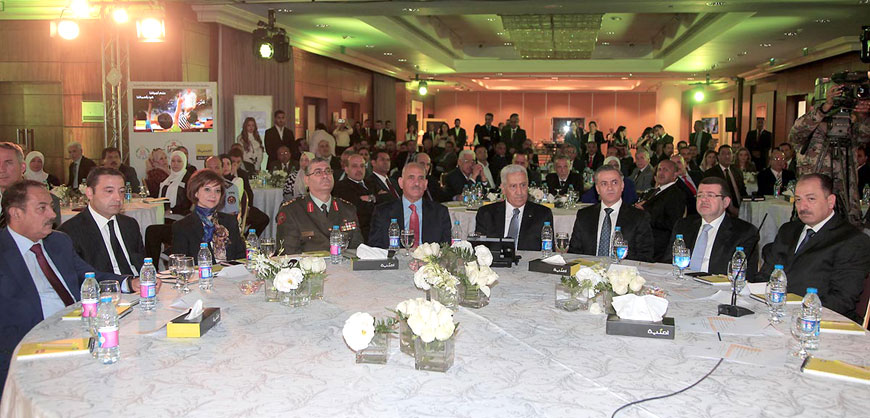 Prime Minister Abdullah Ensour and a number of senior officials attend a ceremony, to launch a project to connect public schools via an integrated network, in Amman, on Monday (Petra photo)