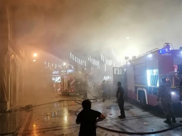 Civil Defence Department personnel extinguish a fire that engulfed the historic Al Husseini Mosque’s second floor on Wednesday night in downtown Amman (Photo courtesy of Awqaf Ministry)