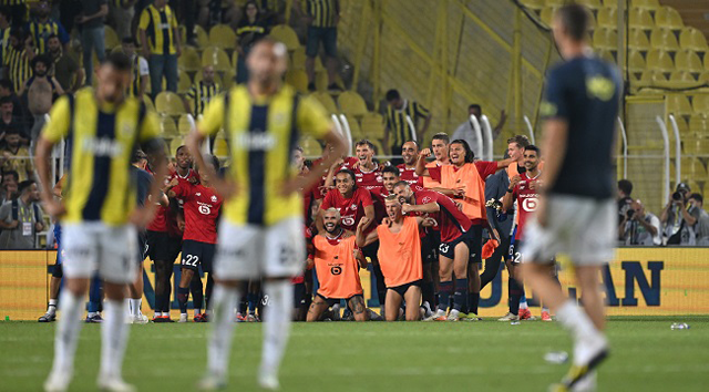 Lille’s players celebrate at the end of the UEFA Champions League 3rd Qualifying Round second leg football match between Fenerbahce and Lille LOSC at the Fenerbahce Sukru Saracoglu Stadium in Istanbul on Tuesday (AFP photo)