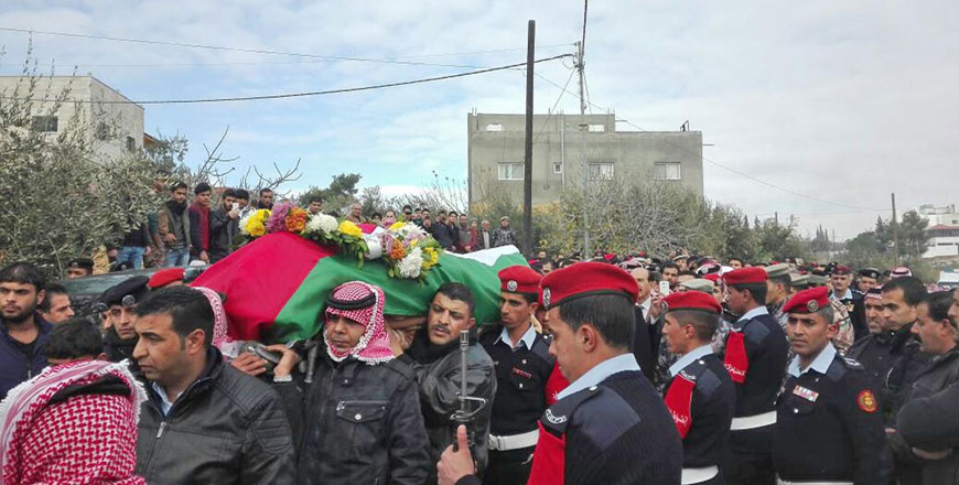 Pallbearers carry the coffin of Warrant Officer Suhaib Sawaeer during his funeral in Naour District on Monday (Petra photo)