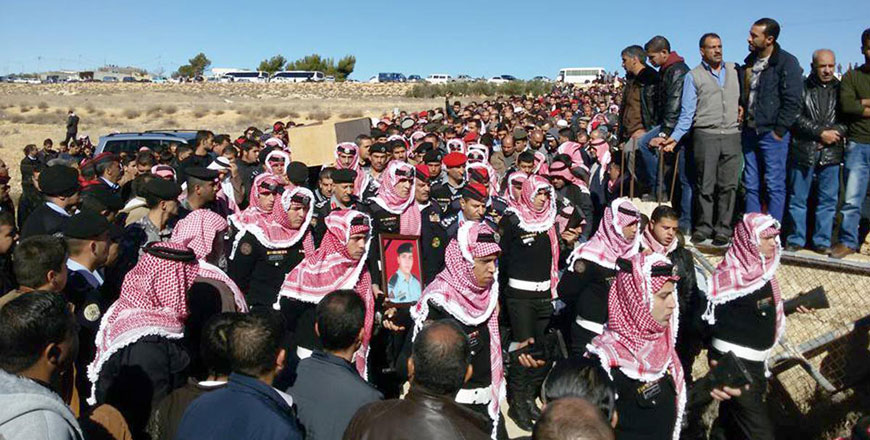 Hundreds of Tafileh residents in Ain Al Beida take part in the funeral of Sgt. Khalil Dhrous on Wednesday (Petra photo)