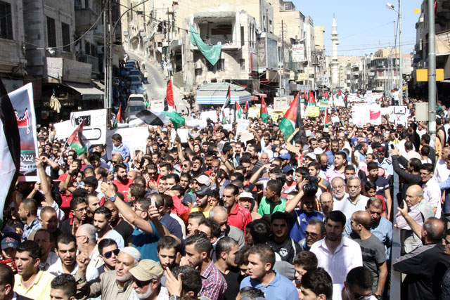 Protesters demonstrate against the gas deal with Israel in downtown Amman on Friday (Photo by Osama Aqarbeh)