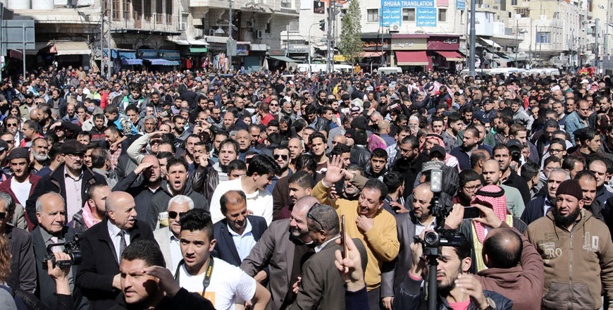 Protesters demonstrate against price hikes in downtown Amman on Friday (Photo by Osama Aqarbeh)