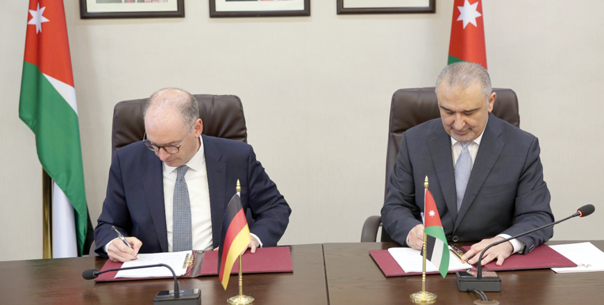 Planning and International Cooperation Minister Nasser Shraideh and German Parliamentary State Secretary at the Federal Ministry for Economic Cooperation and Development Niels Annen sign 413.9 million euros agreement in assistance to Jordan for 2022-2023, on Friday (Photo courtesy of Planning Ministry)