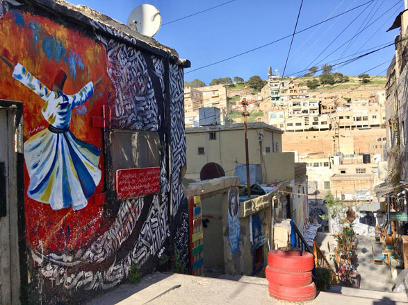 Graffiti works are seen on Kalha stairs that link Jabal Luwebideh with downtown Amman (Photo by Muath Freij)