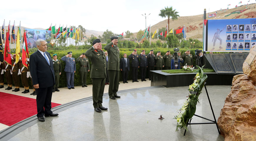 His Majesty King Abdullah, the Supreme Commander of the Jordan Armed Forces-Arab Army, attends a ceremony to mark the anniversary of Karamah Battle in the Jordan Valley on Monday (Photo courtesy of Royal Court)