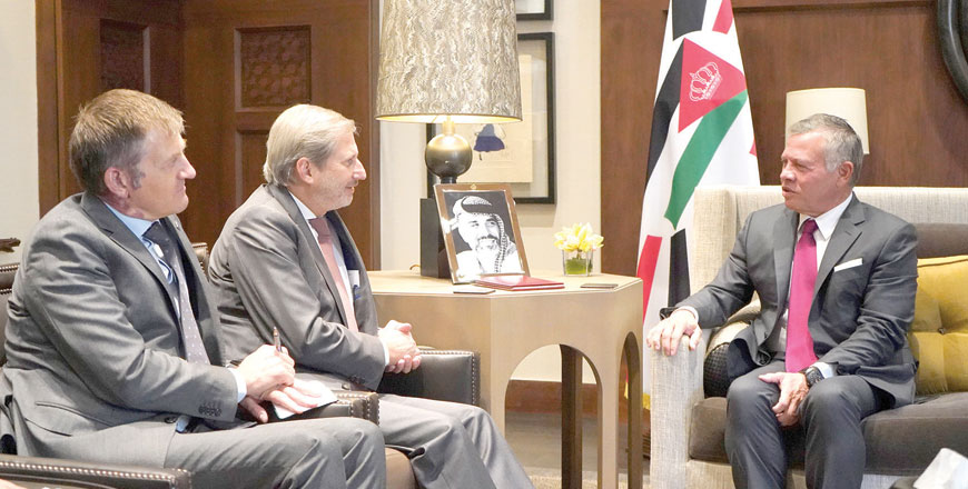 His Majesty King Abdullah meets with EU Commissioner for Enlargement and European Neighbourhood Policy Johannes Hahn in Amman on Monday (Photo courtesy of Royal Court)