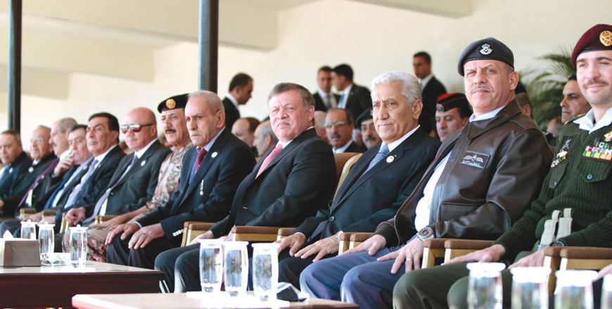 His Majesty King Abdullah attends a ceremony to mark Veterans Day; Ex-servicemen take part in a march to celebrate the occasion in Amman on Monday (Photo courtesy of Royal Court)