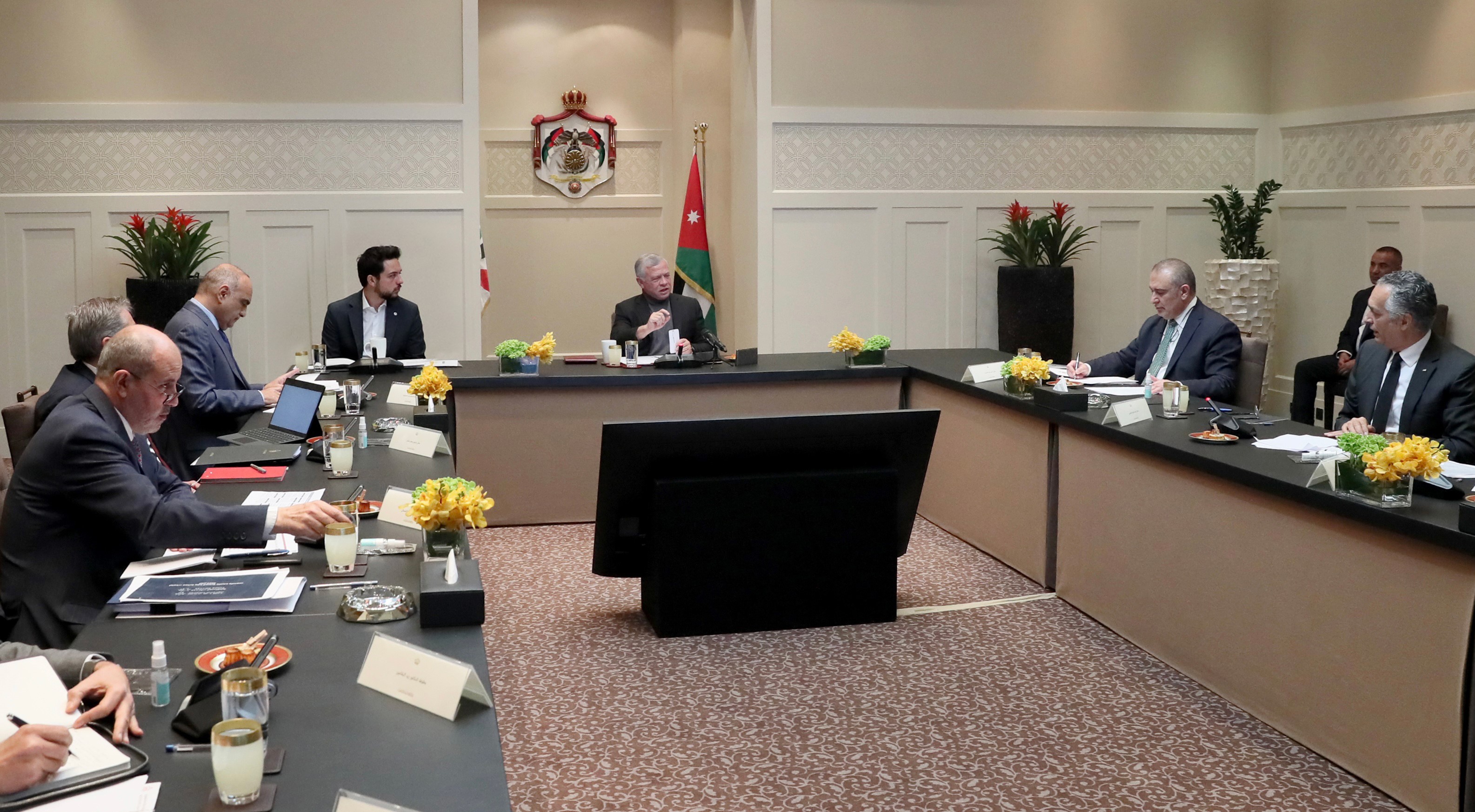 His Majesty King Abdullah is briefed on the government's programme to implement the Economic Modernisation Vision in industry, labour and tourism within the specified timeframe, during a meeting at Al Husseiniya Palace attended by HRH Crown Prince Hussein on Wednesday (Photo courtesy of Royal Court)