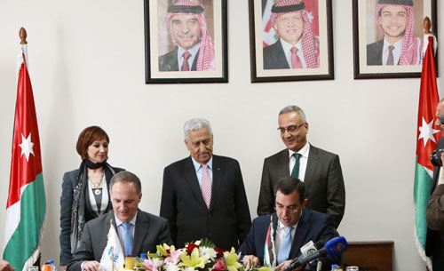 Planning and International Cooperation Minister Imad Fakhoury and EHS Chairman Rami Farraj sign a five-year framework agreement on Monday in the presence of Prime Minister Abdullah Ensour, ICT Minister Majd Shweikeh and Health Minister Ali Hiasat (Photo courtesy Ministry of  Planning and International Cooperation)