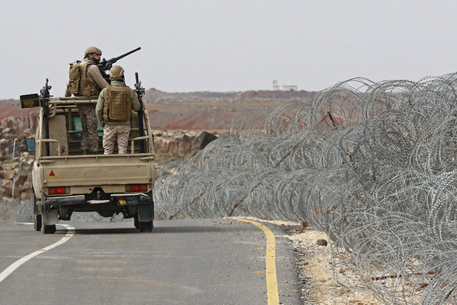 Above, army soldiers patrol along the border with Syria to prevent trafficking on February 17, 2022 (AFP photo)