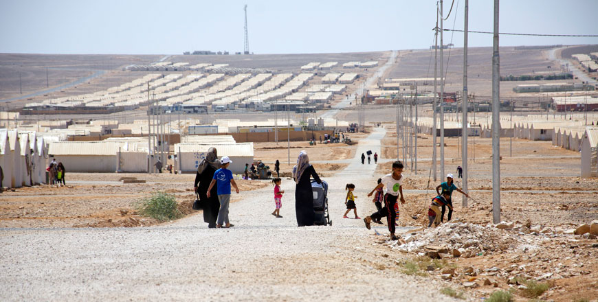 Syrian refugees are seen at Azraq Camp, around 100km from Amman, in the eastern desert (Photo by Amjad Ghsoun)