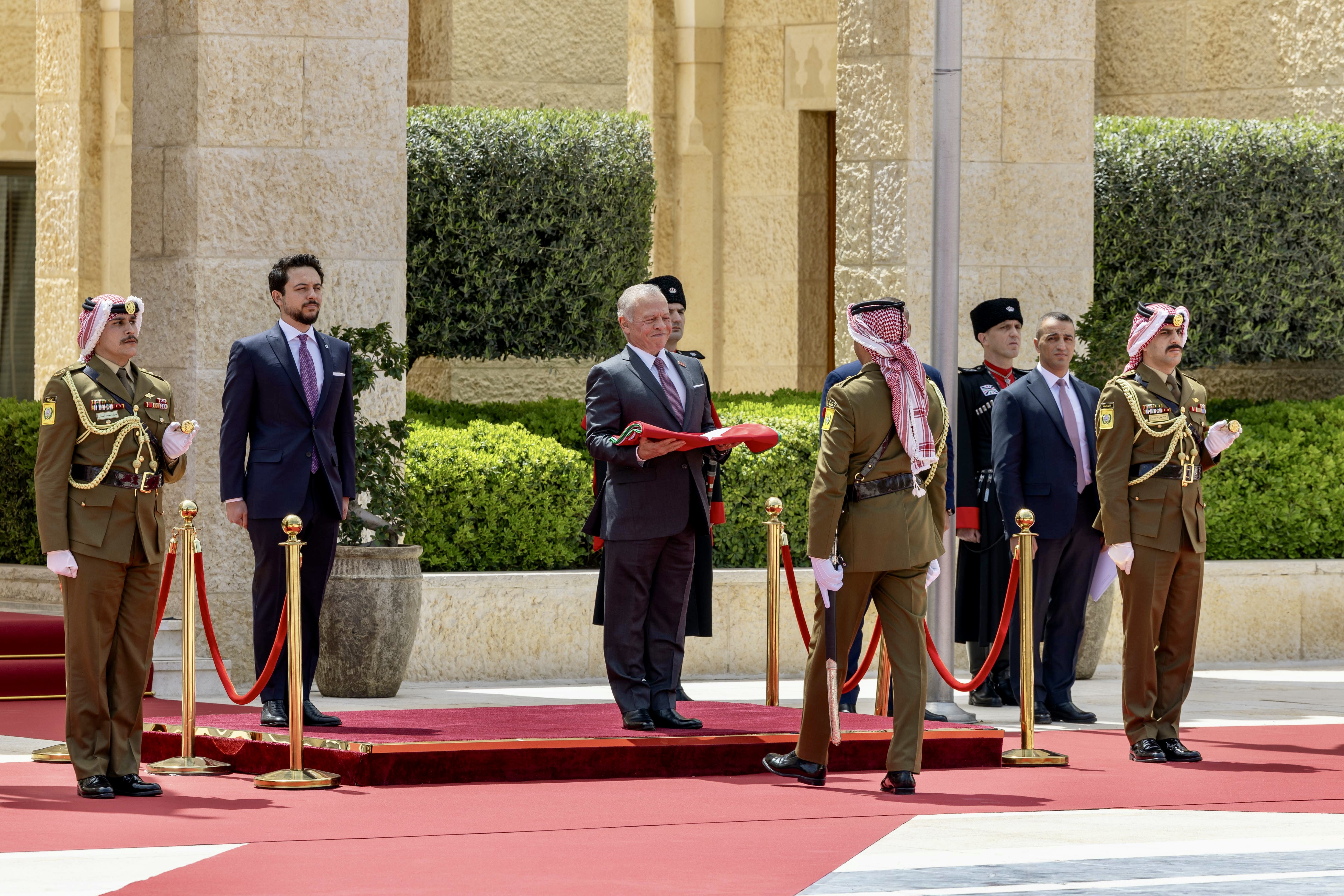 His Majesty King Abdullah on Wednesday attends the flag raising ceremony at Al Husseiniya Palace on the occasion of Jordan’s National Flag Day, which falls on 16 April each year (Photo courtesy of Royal Court)