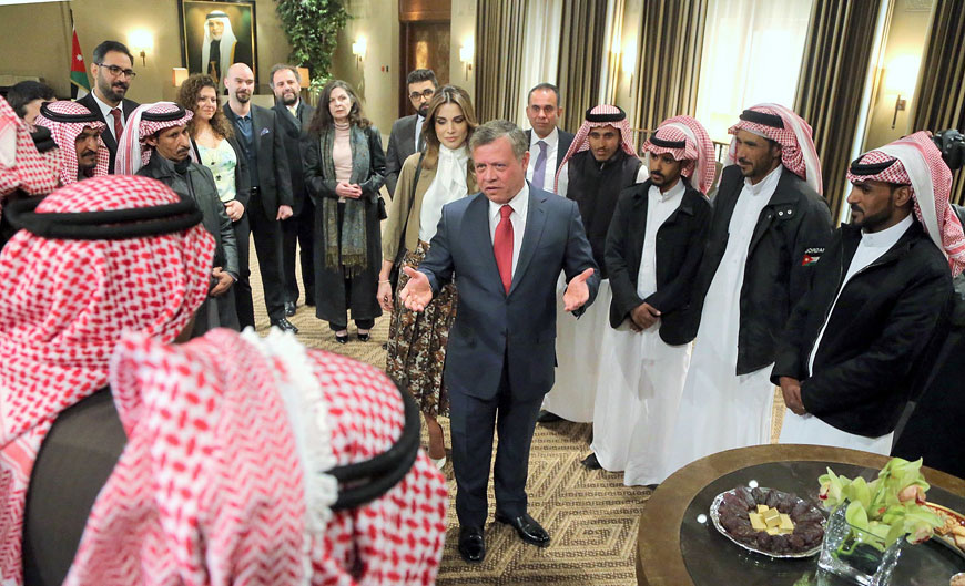 Their Majesties King Abdullah and Queen Rania meet with the cast and crew of ‘Theeb’ at Al Husseiniya Palace on Tuesday  (Photo courtesy of Royal Court)