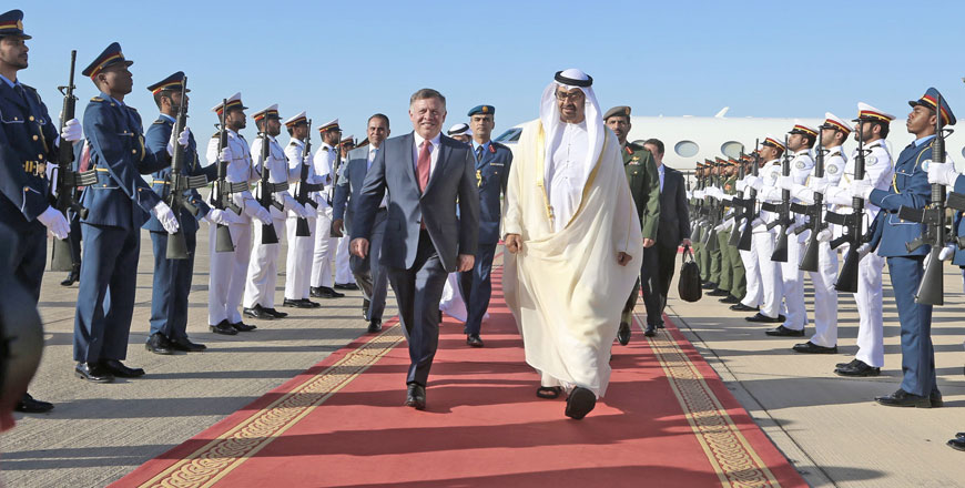 His Majesty King Abdullah and Sheikh Mohammad Bin Zayed Al Nahyan, Abu Dhabi crown prince and deputy supreme commander of the UAE armed forces, review the honour guard in Abu Dhabi on Sunday (Photo courtesy of Royal Court)