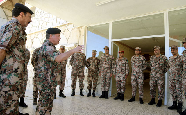 His Majesty King Abdullah speaks to soldiers from a Rapid Response Unit on Monday (Photo courtesy of Royal Court)