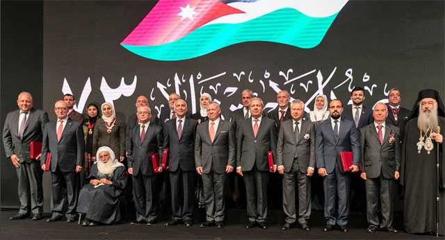 His Majesty King Abdullah attends a ceremony at the Cultural Palace marking the 73rd Independence Day on Saturday, during which he honoured a number of Jordanians for for their contributions (Photo courtesy of Royal Court)