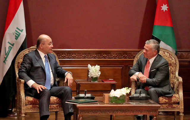 His Majesty King Abdullah meets with Iraqi President Barham Saleh at Basman Palace on Thursday (Photo courtesy of Royal Court)