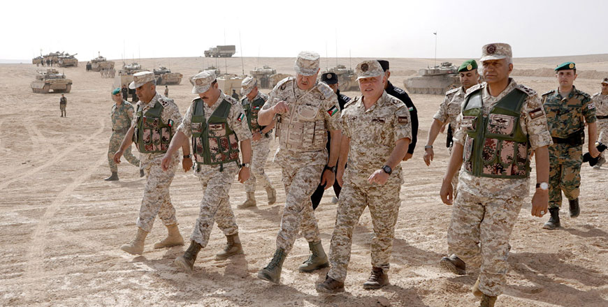 His Majesty King Abdullah attends a tactical exercise conducted by the Second Royal Armoured Battalion of the 40th King Hussein Bin Talal Royal Armoured Brigade on Tuesday (Photo courtesy of Royal Court)