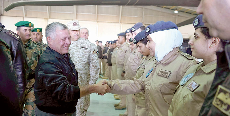 His Majesty King Abdullah meets with Royal Jordanian Air Force personnel at King Abdullah II Air Base on Monday (Photo courtesy of Royal Court)