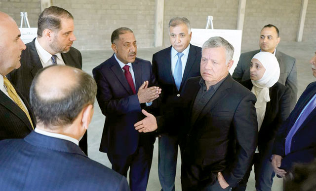His Majesty King Abdullah checks on progress of the Madaba Industrial Estate project on Wednesday (Photo courtesy of Royal Court)