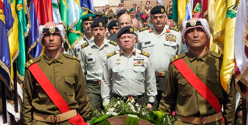 His Majesty King Abdullah, accompanied by HRH Crown Prince Hussein, attends a ceremony at the Unknown Soldier Monument in the Jordan Valley to mark the 51st anniversary of the Karameh Battle on Thursday (Photo courtesy of Royal Court)