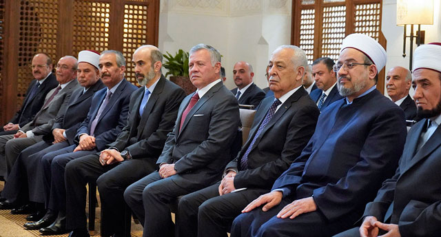 His Majesty King Abdullah attends a signing marking the launch of a waqf dedicated to the study of Imam Al Suyuti's work at Al Husseiniya Palace on Monday (Photo courtesy of Royal Court )
