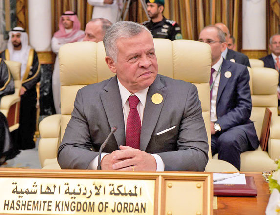 His Majesty King Abdullah heads the Jordanian delegation to the emergency Arab summit in Mecca on Thursday (Photo courtesy of Royal Court)
