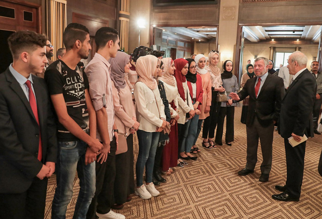   His Majesty King Abdullah meets with top General Secondary Education Certificate Examination (Tawjihi) achievers for the 2018-2019 scholastic year at Al Husseiniya Palace on Tuesday (Photo courtesy of Royal Court)
