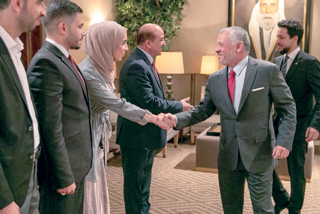 His Majesty King Abdullah, accompanied by HRH Crown Prince Hussein, meets with youth from Karak Governorate at Al Husseiniya Palace on Monday (Photo courtesy of Royal Court)