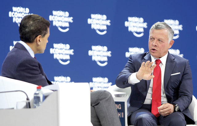 His Majesty King Abdullah talks to CNN’s Fareed Zakaria during a WEF session in Davos on Thursday  (Photo courtesy of Royal Court)