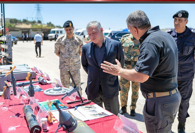His Majesty King Abdullah tours the training premises of the explosives handling unit, of the Public Security Department's Preventative Security, following its inauguration on Monday (Photo courtesy of Royal Court)