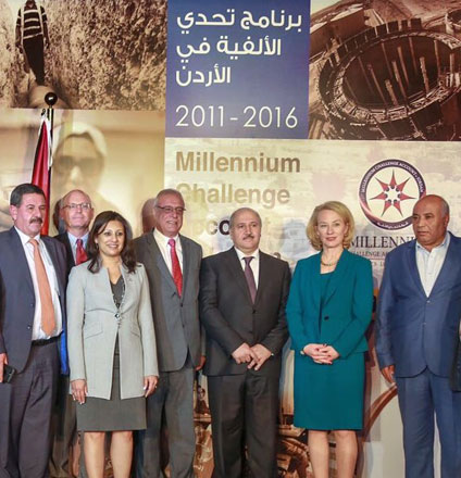 Jordanian and US officials pose for a group photo in Amman on Thursday during a ceremony to mark the completion of the Millennium Challenge Account–Jordan’s programme in the Kingdom (Photo courtesy of MCA–Jordan)