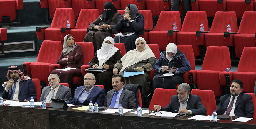 Deputies seen attending Tuesday's session at the conference hall of the King Abdullah I Mosque due to the maintenance works at the Lower House's main debate chamber (Petra photo)