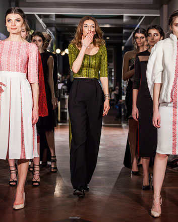 Designer Hama Hinnawi poses for a photo with models showcasing her designs at the ‘Milano Moda Donna Fashion Week 2017/2018’, in Italy in February (Photo courtesy of Hama Hinnawi and Mohammad Abu Dawwas)