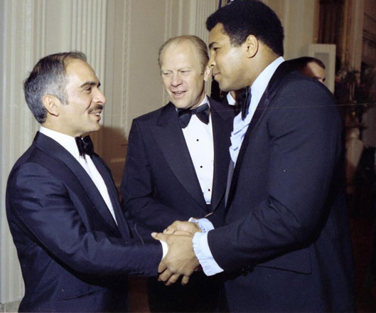 An undated photo of His Majesty the late King Hussein with Muhammad Ali posted on social media by the Royal Court on Saturday (Photo courtesy of Royal Court)