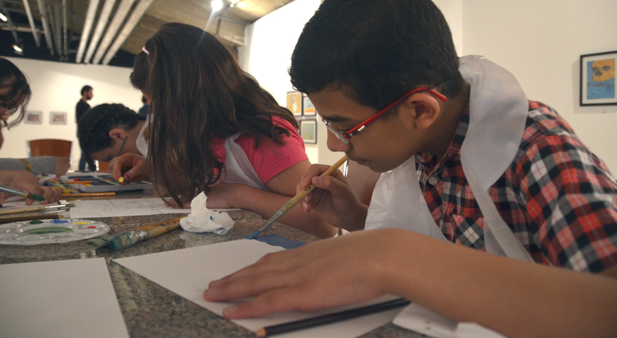 Young students with visual disabilities prepare paintings at Zara Centre in Amman last week (Photo by Muath Freij)