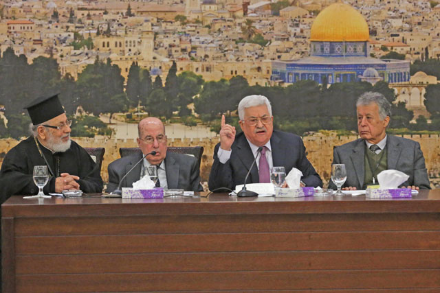 Palestinian President Mahmoud Abbas (second right) makes a speech as he attends the 28th session of the Palestinian Central Council in Ramallah, West Bank, on Saturday (AFP photo)