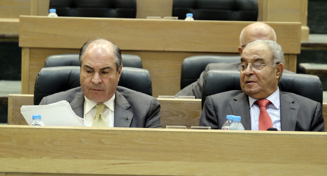 Prime Minister Hani Mulki and Minister of State for Prime Ministry Affairs Mamdouh Abbadi attend a recent Lower House session (Photo by Osama Aqarbeh)