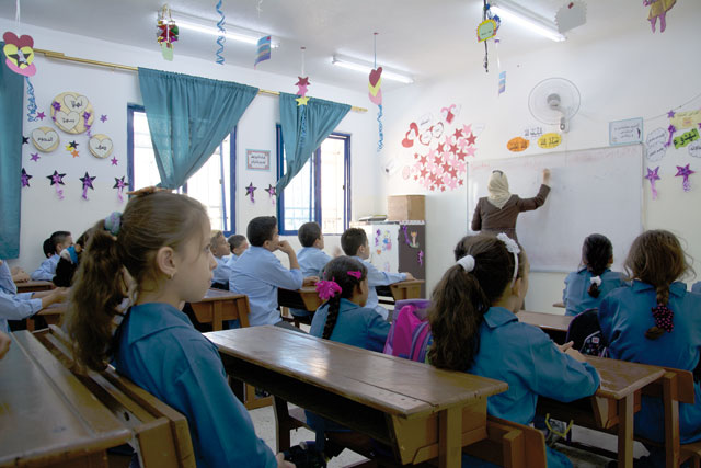 Some private schools would pay teachers monthly salaries as low as JD120, according to the Education Ministry (Photo by Amjad Ghsoun)