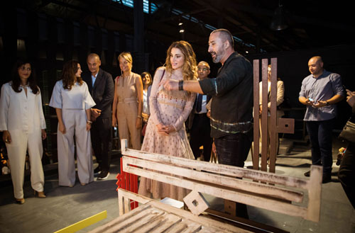 Her Majesty Queen Rania attends an opening reception of Amman Design Week at Ras Al Ain Gallery and Hangar in downtown Amman on Tuesday (Photo courtesy of Royal Court)