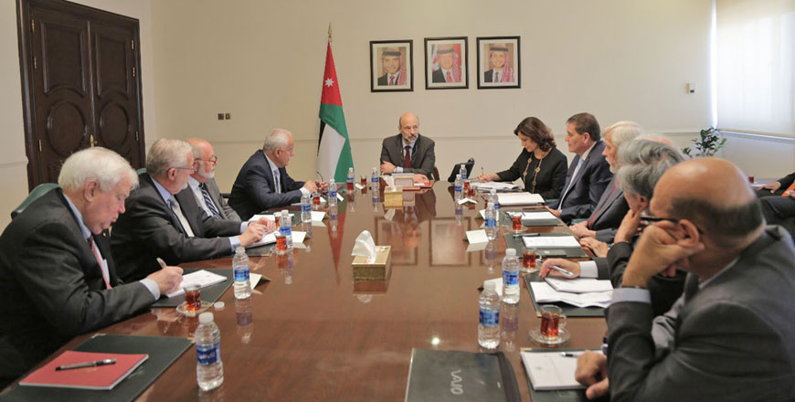 Prime Minister Omar Razzaz meets with the International Advisory Group in Amman on Thursday   (Petra photo)
