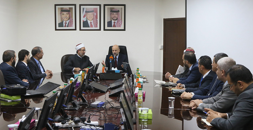 Prime Minister Omar Razzaz on Wednesday checks on  preparations for this year’s Hajj season during a meeting with Minister of Awqaf and Islamic Affairs Abdul Nasser Abul Bassal and other officials  (Petra photo)